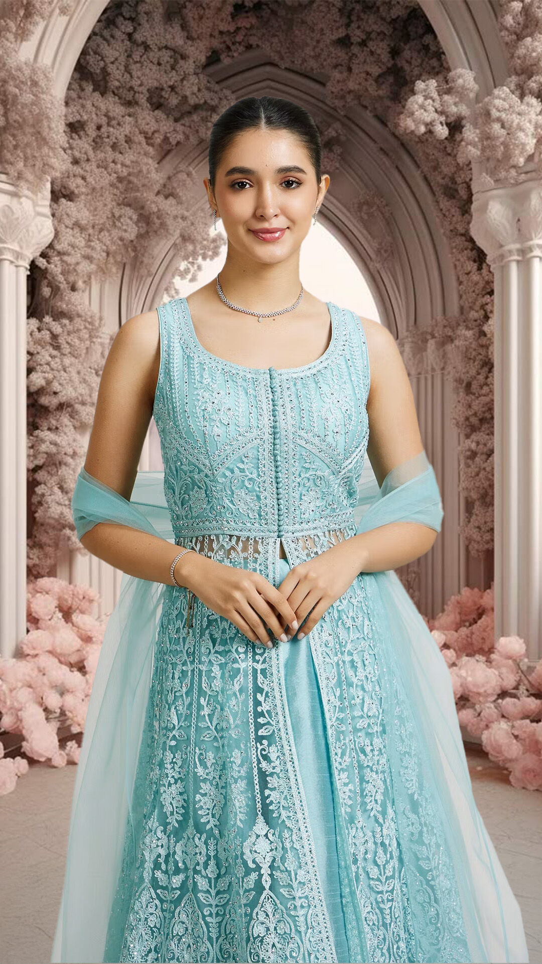  Long jacket salwar suit paired with a flowing skirt for an elegant look.